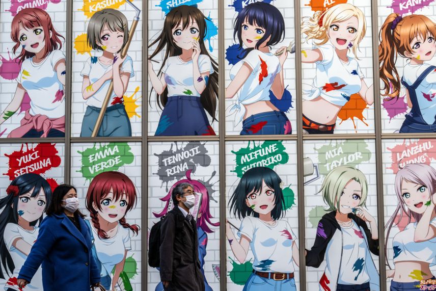 12 anime characters on a wall in Japan